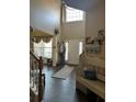 Welcoming foyer with hardwood floors, bench seating, and natural light at 920 Pintail Ct, Canton, GA 30115