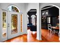 Elegant entryway with hardwood floors and stained glass door at 101 Constance Dr, Locust Grove, GA 30248