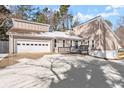 Ranch style home with new siding, deck and a two car garage at 1483 Hidden Hills Pkwy, Stone Mountain, GA 30088