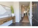 Bright entry hall with wood-look floors and a runner at 2639 Cacao Sq, Acworth, GA 30101