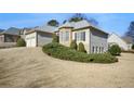 House with landscaping and neighborhood in background at 200 Holly Chase Ct, Canton, GA 30114