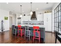 Modern kitchen with island and stainless steel appliances at 230 Vickery Falls Dr, Roswell, GA 30075