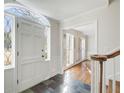 Bright entryway with slate floor and view to living area at 882 Edgewater Trl, Atlanta, GA 30328