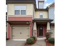 Townhome exterior featuring a two-toned color scheme and a stone accent at 4116 Mars Bay # 27, Acworth, GA 30101