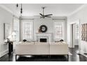 Spacious living room with a marble fireplace and built-in shelving at 769 Penn Ne Ave, Atlanta, GA 30308