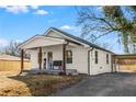 White cottage with covered porch, driveway and carport at 363 Roselane Nw St, Marietta, GA 30060