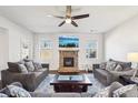 Living room featuring a stone fireplace and comfortable seating at 102 Freedom Dr, Acworth, GA 30102