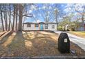 Newly renovated ranch home with landscaped yard at 3460 Fairlane Dr, Atlanta, GA 30331