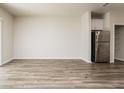 Spacious living room with hardwood floors and neutral walls at 1247 Sunny Lake Dr, Lawrenceville, GA 30043