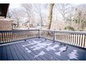 Relaxing deck overlooking the backyard, perfect for outdoor entertaining at 2688 Heritage Ln, Morrow, GA 30260