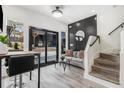 Bright living room with gray sofa and access to backyard patio at 3120 Godby #1109 Rd, College Park, GA 30349