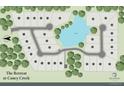 Aerial view showcasing home sites around a central pond at 725 Caney Fork Rd, Alpharetta, GA 30005