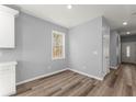 Bright dining area with gray walls and wood-look flooring at 3170 Old Hwy 92 Dr, Acworth, GA 30102