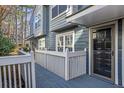 Townhouse exterior boasts a private deck and walkway at 1355 N Crossing Dr, Atlanta, GA 30329