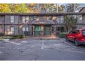 Front view of a townhouse with parking in front at 3948 Cedar Cir, Tucker, GA 30084