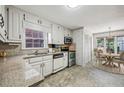 Kitchen with granite countertops and stainless steel appliances at 3134 Henderson Walk, Atlanta, GA 30340