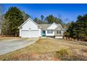 Two-car garage and large front yard at 202 Greentree Trl, Temple, GA 30179