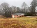 Ranch house view from a distance at 4890 Prince Se Rd, Smyrna, GA 30082