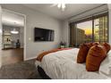 Main bedroom with large windows, city view and comfortable bedding at 565 Peachtree Ne St # 804, Atlanta, GA 30308