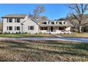 Charming two-story home with white siding and landscaping at 1430 New Hope Church Rd, Loganville, GA 30052