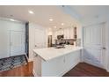 Modern white kitchen with quartz countertops at 230 E Ponce De Leon Ave # 219, Decatur, GA 30030