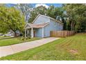 Newly built home with a spacious driveway and fenced backyard at 1302 Ladd St, Atlanta, GA 30310