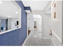 Inviting entryway featuring tile floors, archways and access to the living area through an accent wall window at 6851 Roswell Rd # J1, Atlanta, GA 30328