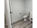 Modern bathroom with updated toilet and flooring at 132 Lamar Nw Ave, Atlanta, GA 30314