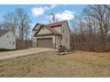 Two-story home featuring a two-car garage and a basketball hoop at 148 Shady View Pl, Lawrenceville, GA 30044