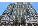 High-rise building with full view of the entrance and landscaping at 250 Pharr Ne Rd # 607, Atlanta, GA 30305