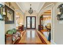 Elegant entryway with hardwood floors and double doors at 1731 Panorama Dr, Locust Grove, GA 30248