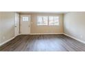 Spacious living room with hardwood floors and neutral walls at 2848 Baker Ridge Nw Dr, Atlanta, GA 30318