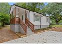 Newly renovated ranch home with modern wooden stairs at 1167 Key Se Rd, Atlanta, GA 30316