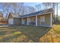 Charming ranch home featuring a stone accent and porch at 4162 Samuel Ct, Norcross, GA 30093