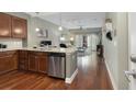 Open kitchen with granite countertops and stainless steel appliances at 200 River Vista Dr # 330, Atlanta, GA 30339