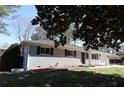 Single-story home featuring a brick exterior and a manicured front yard at 1988 Glenmar Dr, Decatur, GA 30032