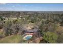 Aerial view of home with pool and large backyard at 10170 Cedar Grove Rd, Chattahoochee Hills, GA 30213