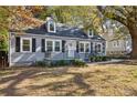 Newly renovated gray house with white trim and landscaping at 2930 Kimmeridge Dr, Atlanta, GA 30344