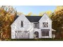 Two-story house with gray brick exterior, attached garage, and fall foliage at 380 Hillcrest View Dr, Suwanee, GA 30024