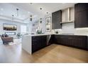 This spacious kitchen features dark wood cabinets and stainless steel appliances at 40 12Th Ne St # 1701, Atlanta, GA 30309