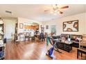 Open living and dining area with hardwood floors at 7165 Fringe Flower Dr # 5, Austell, GA 30168