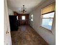 Kitchen with black appliances and brown tile floor at 2369 Christian Cir, Covington, GA 30016