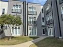 Building exterior showcasing multiple units and landscaping at 502 Pryor Sw St # 322, Atlanta, GA 30312