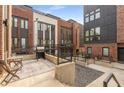 Shared patio area with gravel landscaping and a built-in grill at 1244 Chelsea Nw Cir, Atlanta, GA 30318