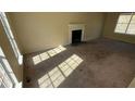 Neutral living room featuring a traditional fireplace at 4990 Windsor Downs Dr, Decatur, GA 30035