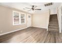 Living room featuring hardwood floors and a staircase at 4079 Parks Ln, Douglasville, GA 30135