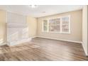 Living room with fireplace and hardwood floors at 4079 Parks Ln, Douglasville, GA 30135
