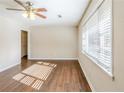 Bright bedroom with hardwood floors and a large window at 3197 Cloverhurst Dr, Atlanta, GA 30344