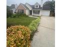 Inviting home with lush green lawn and well-kept front yard at 3745 Hudson Ct, Rex, GA 30273