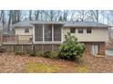 Home features a deck and screened porch at 3870 N Shelby N Ln, Douglasville, GA 30135